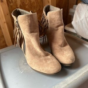 Tan fringe booties